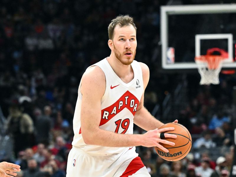 CLEVELAND, OHIO - JANUARY 09: Jakob Poeltl #19 of the Toronto Raptors runs a play during the third quarter against the Cleveland Cavaliers at Rocket Mortgage Fieldhouse on January 09, 2025 in Cleveland, Ohio. The Cavaliers defeated the Raptors 132-126. NOTE TO USER: User expressly acknowledges and agrees that, by downloading and or using this photograph, User is consenting to the terms and conditions of the Getty Images License Agreement. (Photo by Jason Miller/Getty Images)