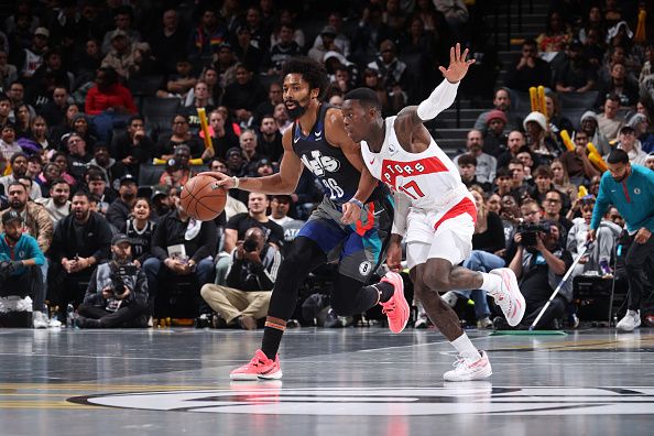 BROOKLYN, NY - NOVEMBER 28: Spencer Dinwiddie #26 of the Brooklyn Nets brings the ball up court against the Toronto Raptors during the In-Season Tournament on November 28, 2023 at Barclays Center in Brooklyn, New York. NOTE TO USER: User expressly acknowledges and agrees that, by downloading and or using this Photograph, user is consenting to the terms and conditions of the Getty Images License Agreement. Mandatory Copyright Notice: Copyright 2023 NBAE (Photo by Nathaniel S. Butler/NBAE via Getty Images)