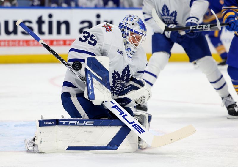 Dec 21, 2023; Buffalo, New York, USA;  Toronto Maple Leafs goaltender Ilya Samsonov (35) makes a save during the second period against the Buffalo Sabres at KeyBank Center. Mandatory Credit: Timothy T. Ludwig-USA TODAY Sports