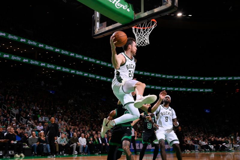 BOSTON, MA - MARCH 20: Pat Connaughton #24 of the Milwaukee Bucks passes the ball during the game against the Boston Celtics on March 20, 2024 at the TD Garden in Boston, Massachusetts. NOTE TO USER: User expressly acknowledges and agrees that, by downloading and or using this photograph, User is consenting to the terms and conditions of the Getty Images License Agreement. Mandatory Copyright Notice: Copyright 2024 NBAE  (Photo by Brian Babineau/NBAE via Getty Images)