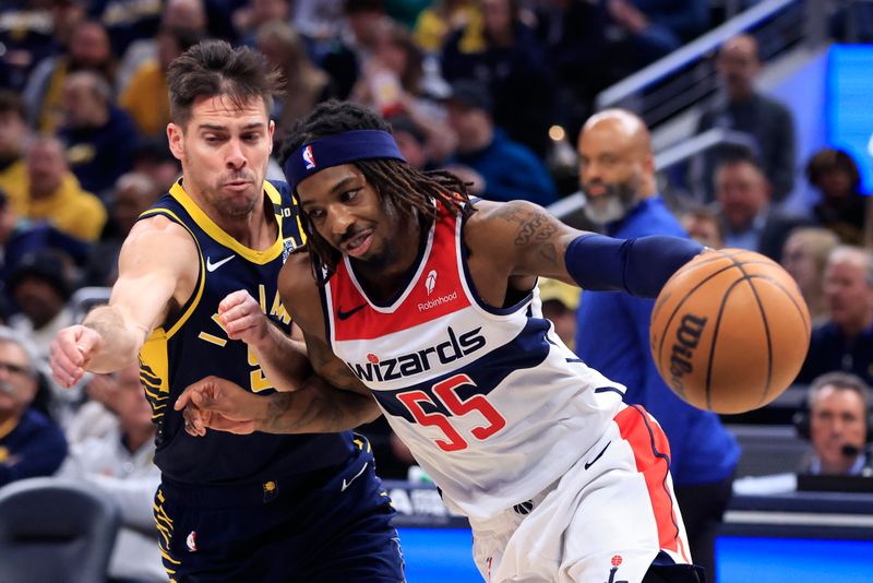 INDIANAPOLIS, INDIANA - JANUARY 10:  Delon Wright #55 of the Washington Wizards drives against T.J. McConnell #9 of the Indiana Pacers during the second quarter at Gainbridge Fieldhouse on January 10, 2024 in Indianapolis, Indiana. NOTE TO USER: User expressly acknowledges and agrees that, by downloading and or using this photograph, User is consenting to the terms and conditions of the Getty Images License Agreement. (Photo by Justin Casterline/Getty Images)