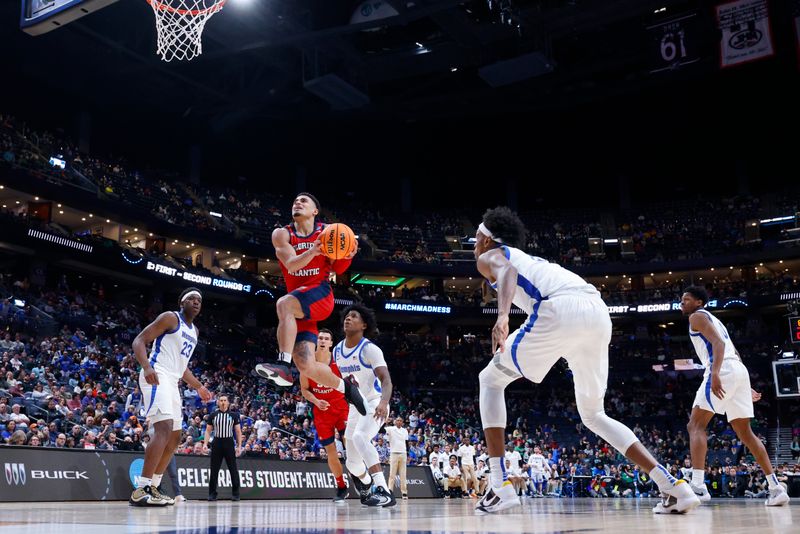 Mar 17, 2023; Columbus, OH, USA; Florida Atlantic Owls guard Bryan Greenlee (4) drives to the basket in the second half against the Memphis Tigers at Nationwide Arena. Mandatory Credit: Rick Osentoski-USA TODAY Sports