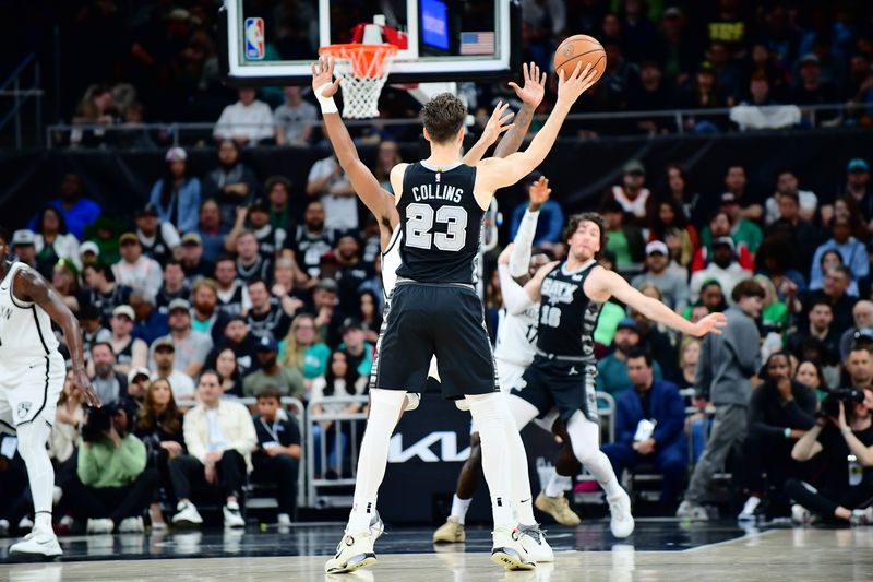 AUSTIN, TX - MARCH 17: Zach Collins #23 of the San Antonio Spurs passes the ball to Cedi Osman #16 during the game against the Brooklyn Nets on March 17, 2024 at the Moody Center in Austin, Texas. NOTE TO USER: User expressly acknowledges and agrees that, by downloading and or using this photograph, user is consenting to the terms and conditions of the Getty Images License Agreement. Mandatory Copyright Notice: Copyright 2024 NBAE (Photos by Michael Gonzales/NBAE via Getty Images)