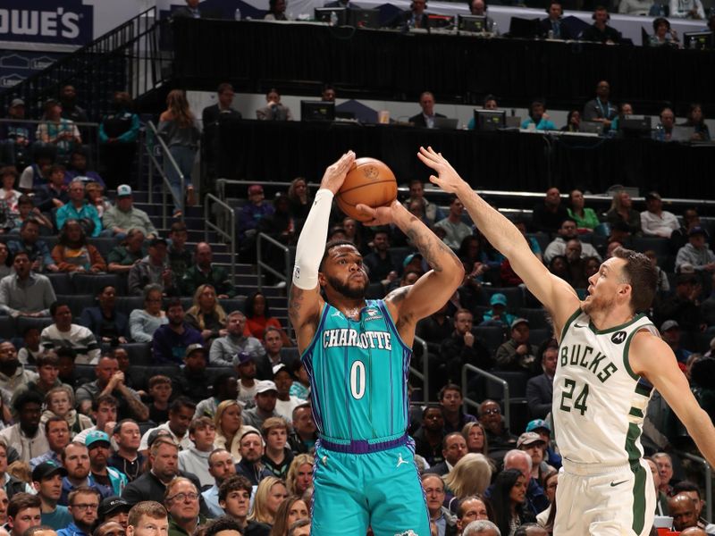 CHARLOTTE, NC - FEBRUARY 29: Miles Bridges #0 of the Charlotte Hornets shoots a three point basket during the game against the Milwaukee Bucks on February 29, 2024 at Spectrum Center in Charlotte, North Carolina. NOTE TO USER: User expressly acknowledges and agrees that, by downloading and or using this photograph, User is consenting to the terms and conditions of the Getty Images License Agreement. Mandatory Copyright Notice: Copyright 2024 NBAE (Photo by Kent Smith/NBAE via Getty Images)