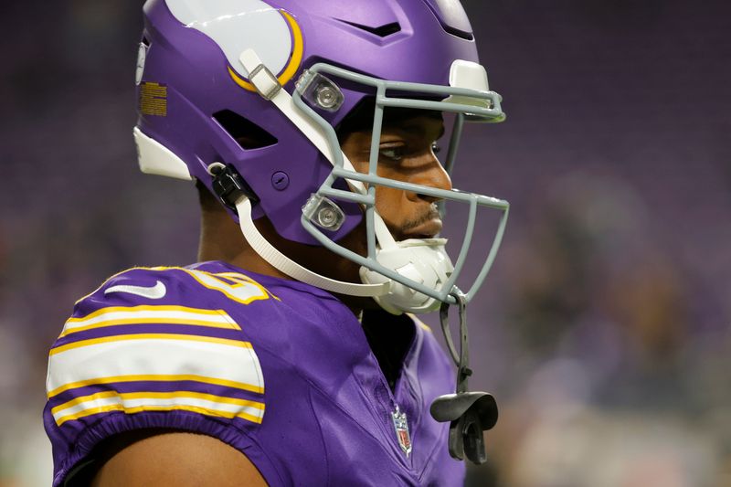 Minnesota Vikings running back Kene Nwangwu (26) walks on the field before an NFL football game against the Chicago Bears, Monday, Nov. 27, 2023, in Minneapolis. (AP Photo/Bruce Kluckhohn)