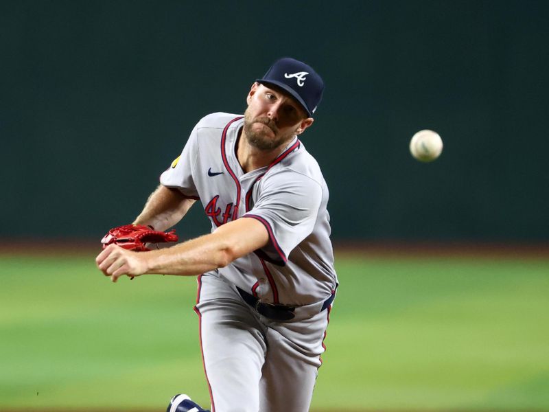 Jul 9, 2024; Phoenix, Arizona, USA; Atlanta Braves pitcher Chris Sale throws in the third inning against the Arizona Diamondbacks at Chase Field. Mandatory Credit: Mark J. Rebilas-USA TODAY Sports