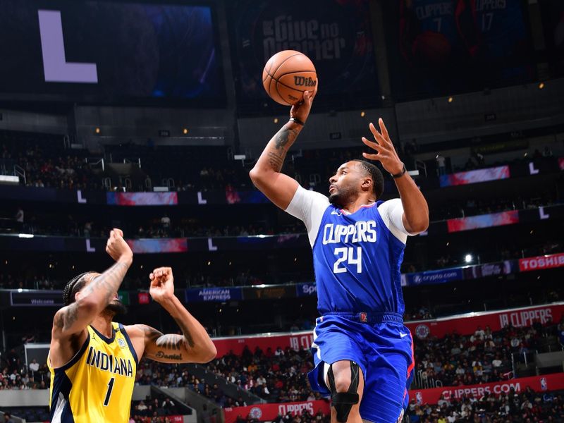 LOS ANGELES, CA - MARCH 25: Norman Powell #24 of the LA Clippers shoots the ball during the game against the Indiana Pacers on March 25, 2024 at Crypto.Com Arena in Los Angeles, California. NOTE TO USER: User expressly acknowledges and agrees that, by downloading and/or using this Photograph, user is consenting to the terms and conditions of the Getty Images License Agreement. Mandatory Copyright Notice: Copyright 2024 NBAE (Photo by Adam Pantozzi/NBAE via Getty Images)