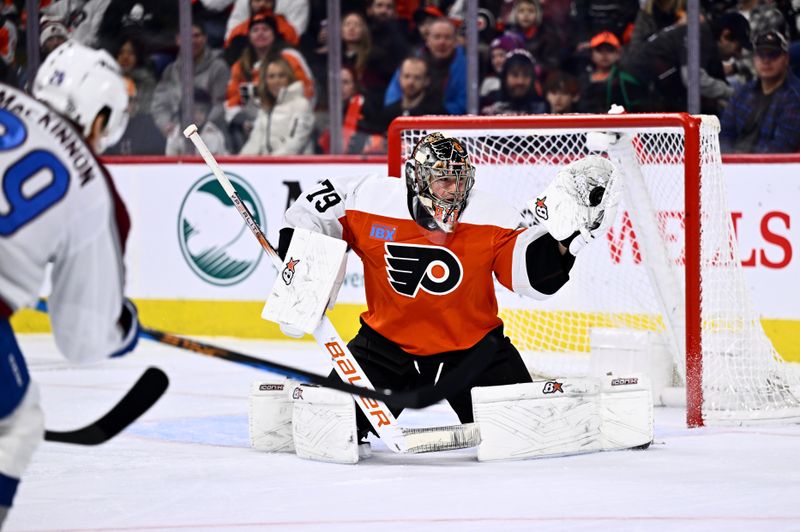 Jan 20, 2024; Philadelphia, Pennsylvania, USA; Philadelphia Flyers goalie Carter Hart (79) makes a save against the Colorado Avalanche in the first period at Wells Fargo Center. Mandatory Credit: Kyle Ross-USA TODAY Sports