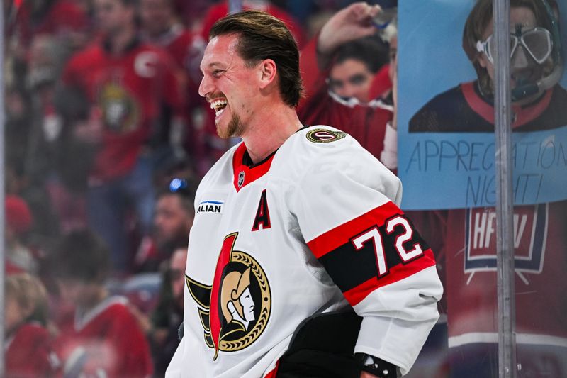 Oct 12, 2024; Montreal, Quebec, CAN; Ottawa Senators defenseman Thomas Chabot (72) has a laugh during warm-up before a game against the Montreal Canadiens at Bell Centre. Mandatory Credit: David Kirouac-Imagn Images