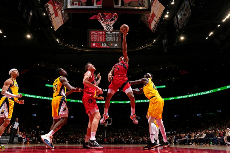 TORONTO, CANADA - FEBRUARY 14: Scottie Barnes #4 of the Toronto Raptors drives to the basket during the game against the Indiana Pacers on February 14, 2024 at the Scotiabank Arena in Toronto, Ontario, Canada.  NOTE TO USER: User expressly acknowledges and agrees that, by downloading and or using this Photograph, user is consenting to the terms and conditions of the Getty Images License Agreement.  Mandatory Copyright Notice: Copyright 2024 NBAE (Photo by Mark Blinch/NBAE via Getty Images)