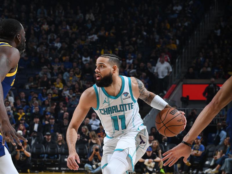 SAN FRANCISCO, CA - FEBRUARY 23: Cody Martin #11 of the Charlotte Hornets dribbles the ball during the game against the Golden State Warriors on February 23, 2024 at Chase Center in San Francisco, California. NOTE TO USER: User expressly acknowledges and agrees that, by downloading and or using this photograph, user is consenting to the terms and conditions of Getty Images License Agreement. Mandatory Copyright Notice: Copyright 2024 NBAE (Photo by Noah Graham/NBAE via Getty Images)