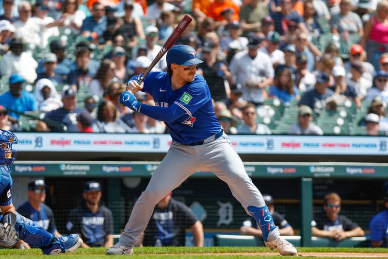 May 26, 2024; Detroit, Michigan, USA; Toronto Blue Jays catcher Danny Jansen (9) looks on during an at bat in the first inning of the game against the Detroit Tigers at Comerica Park. Mandatory Credit: Brian Bradshaw Sevald-USA TODAY Sports