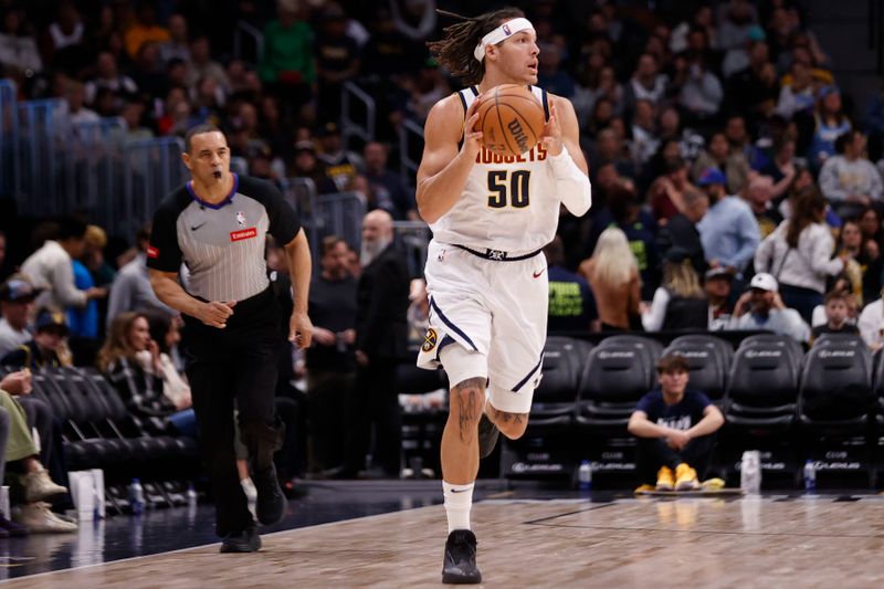 DENVER, COLORADO - FEBRUARY 28: Aaron Gordon #50 of the Denver Nuggets looks to pass against the Sacramento Kings at Ball Arena on February 28, 2024 in Denver, Colorado. NOTE TO USER: User expressly acknowledges and agrees that, by downloading and or using this photograph, User is consenting to the terms and conditions of the Getty Images License Agreement. (Photo by Brendall O'Banon/Clarkson Creative/Getty Images)