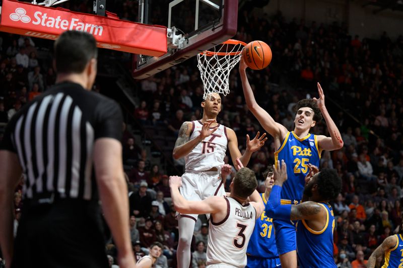 Feb 18, 2023; Blacksburg, Virginia, USA; Pittsburgh Panthers forward Guillermo Diaz Graham (25) grabs a rebound in front of Virginia Tech Hokies center Lynn Kidd (15) in the second half at Cassell Coliseum. Mandatory Credit: Lee Luther Jr.-USA TODAY Sports