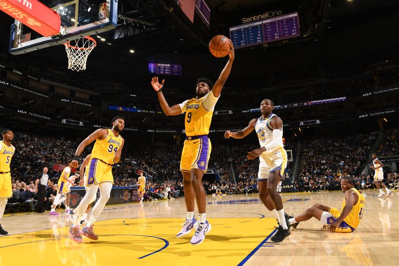 SAN FRANCISCO, CA - OCTOBER 18: Bronny James #9 of the Los Angeles Lakers goes up for the rebound during the game against the Golden State Warriors during a NBA Preseason game on October 18, 2024 at Chase Center in San Francisco, California. NOTE TO USER: User expressly acknowledges and agrees that, by downloading and or using this photograph, user is consenting to the terms and conditions of Getty Images License Agreement. Mandatory Copyright Notice: Copyright 2024 NBAE (Photo by Noah Graham/NBAE via Getty Images)