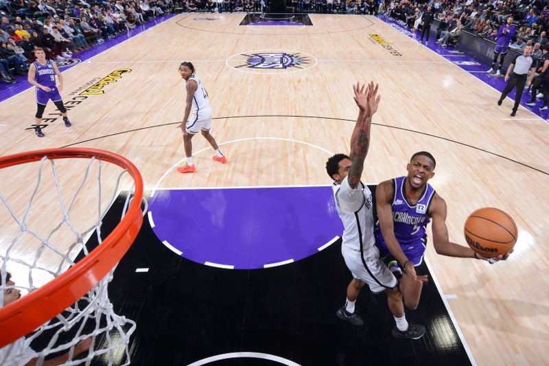 SACRAMENTO, CA - NOVEMBER 24: De'Aaron Fox #5 of the Sacramento Kings drives to the basket during the game against the Brooklyn Nets on November 24, 2024 at Golden 1 Center in Sacramento, California. NOTE TO USER: User expressly acknowledges and agrees that, by downloading and or using this Photograph, user is consenting to the terms and conditions of the Getty Images License Agreement. Mandatory Copyright Notice: Copyright 2024 NBAE (Photo by Rocky Widner/NBAE via Getty Images)