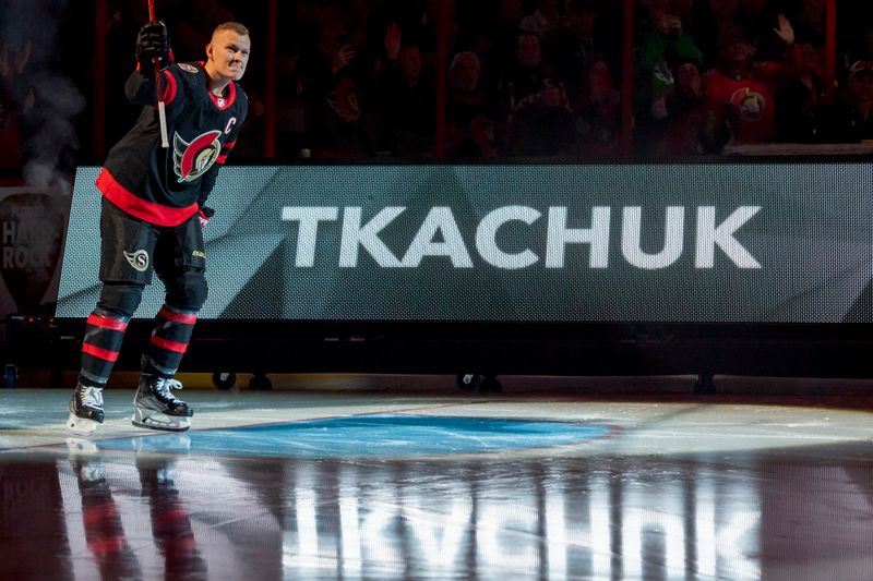 Oct 18, 2022; Ottawa, Ontario, CAN; Ottawa Senators left wing Brady Tkachuk (7) skates up the ice as he is introduced prior to the start of game against the Boston Bruins at the Canadian Tire Centre. Mandatory Credit: Marc DesRosiers-USA TODAY Sports