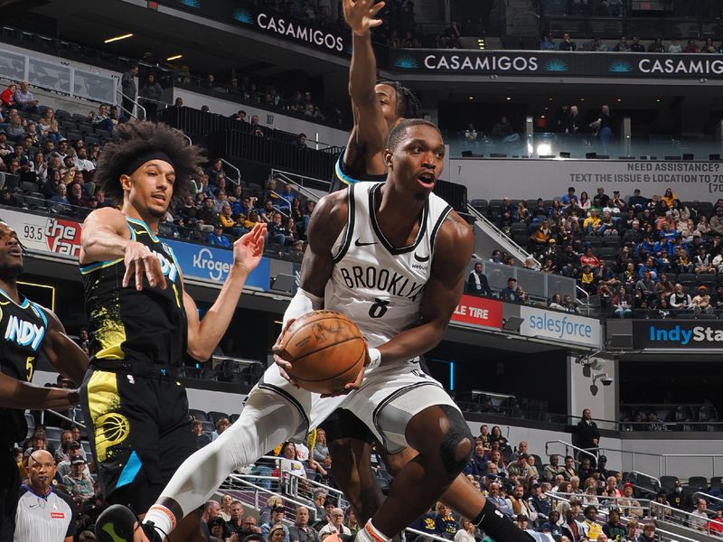 INDIANAPOLIS, IN - MARCH 16: Lonnie Walker IV #8 of the Brooklyn Nets grabs the rebound during the game against the Indiana Pacers on March 16, 2024 at Gainbridge Fieldhouse in Indianapolis, Indiana. NOTE TO USER: User expressly acknowledges and agrees that, by downloading and or using this Photograph, user is consenting to the terms and conditions of the Getty Images License Agreement. Mandatory Copyright Notice: Copyright 2024 NBAE (Photo by Ron Hoskins/NBAE via Getty Images)