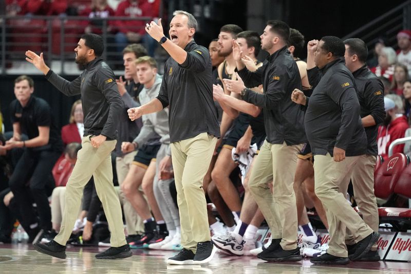 Jan 13, 2024; Madison, Wisconsin, USA; Northwestern Wildcats head coach Chris Collins calls his players to the bench during the first half against the Wisconsin Badgers at the Kohl Center. Mandatory Credit: Kayla Wolf-USA TODAY Sports