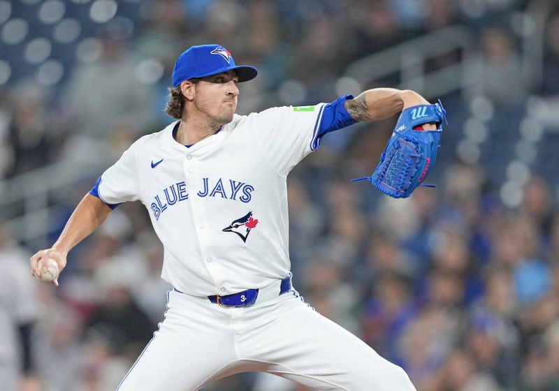 Apr 17, 2024; Toronto, Ontario, CAN; Toronto Blue Jays starting pitcher Kevin Gausman (34) throws a pitch against the New York Yankees during the first inning at Rogers Centre. Mandatory Credit: Nick Turchiaro-USA TODAY Sports