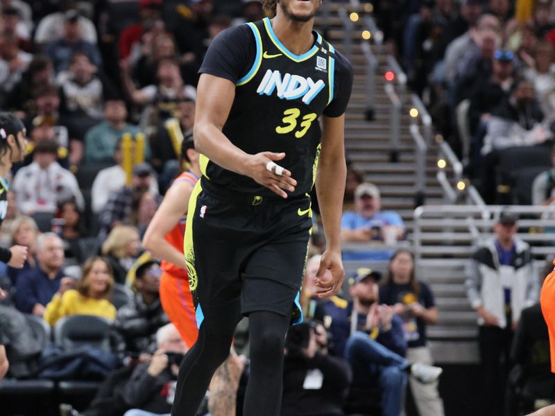 INDIANAPOLIS, INDIANA - APRIL 05: Myles Turner #33 of the Indiana Pacers celebrates after making a three point basket against the Oklahoma City Thunder in the first half at Gainbridge Fieldhouse on April 05, 2024 in Indianapolis, Indiana.    NOTE TO USER: User expressly acknowledges and agrees that, by downloading and or using this photograph, User is consenting to the terms and conditions of the Getty Images License Agreement.  (Photo by Andy Lyons/Getty Images)