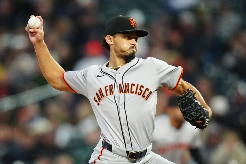 May 8, 2024; Denver, Colorado, USA; San Francisco Giants starting pitcher Jordan Hicks (12) delivers a pitch in the fifth inning against the Colorado Rockies at Coors Field. Mandatory Credit: Ron Chenoy-USA TODAY Sports