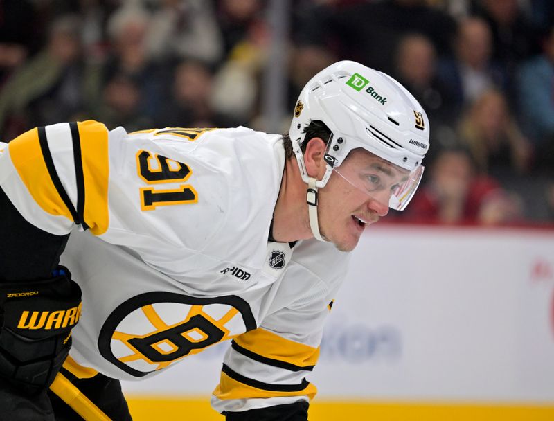 Nov 15, 2025; Montreal, Quebec, CAN; Boston Bruins defenseman Nikita Zadorov (91) prepares for a face off against the Montreal Canadiens during the second period at the Bell Centre. Mandatory Credit: Eric Bolte-Imagn Images