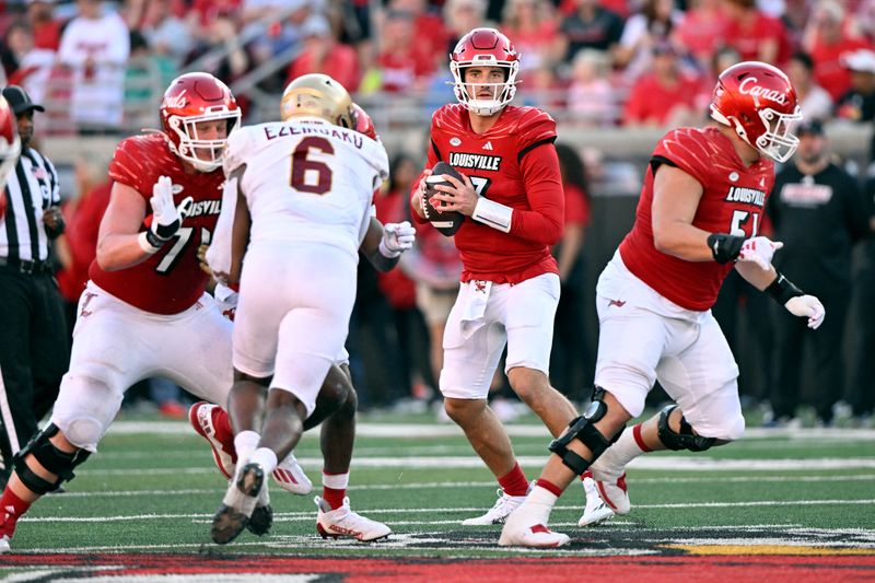 Sep 23, 2023; Louisville, Kentucky, USA;  Louisville Cardinals quarterback Jack Plummer (13) looks to pass againt the Boston College Eagles during the second half at L&N Federal Credit Union Stadium. Louisville defeated Boston College 56-28. Mandatory Credit: Jamie Rhodes-USA TODAY Sports