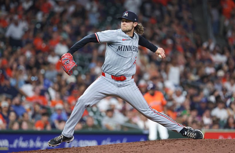 May 31, 2024; Houston, Texas, USA; Minnesota Twins relief pitcher Steven Okert (16) delivers a pitch during the eighth inning against the Houston Astros at Minute Maid Park. Mandatory Credit: Troy Taormina-USA TODAY Sports