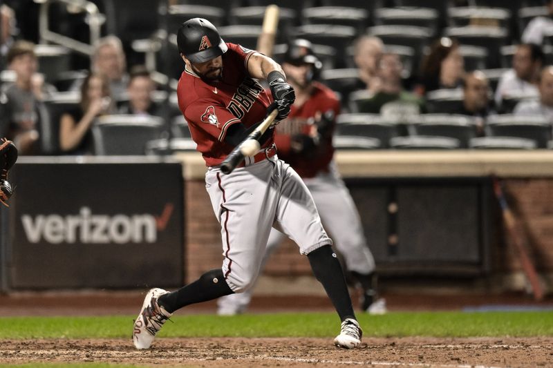 Sep 11, 2023; New York City, New York, USA; Arizona Diamondbacks left fielder Tommy Pham (28) hits a solo home run against the New York Mets during the eighth inning at Citi Field. Mandatory Credit: John Jones-USA TODAY Sports