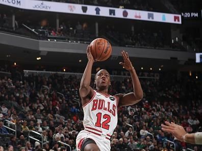 MILWAUKEE, WI - DECEMBER 11:  Ayo Dosunmu #12 of the Chicago Bulls goes to the basket during the game on December 11, 2023 at the Fiserv Forum Center in Milwaukee, Wisconsin. NOTE TO USER: User expressly acknowledges and agrees that, by downloading and or using this Photograph, user is consenting to the terms and conditions of the Getty Images License Agreement. Mandatory Copyright Notice: Copyright 2023 NBAE (Photo by Gary Dineen/NBAE via Getty Images).