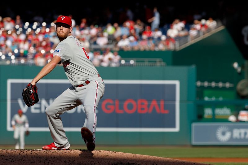 Sep 28, 2024; Washington, District of Columbia, USA; Philadelphia Phillies starting pitcher Zack Wheeler (45) pitches against the Washington Nationals during the first inning at Nationals Park. Mandatory Credit: Geoff Burke-Imagn Images