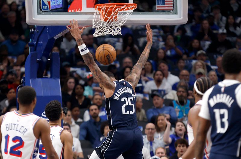 DALLAS, TX - MARCH 16: P.J. Washington #25 of the Dallas Mavericks reacts after scoring against the Philadelphia 76ers during the first half at American Airlines Center on March 16, 2025 in Dallas, Texas. NOTE TO USER: User expressly acknowledges and agrees that, by downloading and or using this photograph, User is consenting to the terms and conditions of the Getty Images License Agreement. (Photo by Ron Jenkins/Getty Images)