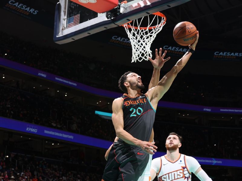 WASHINGTON, DC -? FEBRUARY 4: Landry Shamet #20 of the Washington Wizards drives to the basket during the game against the Phoenix Suns on February 4, 2024 at Capital One Arena in Washington, DC. NOTE TO USER: User expressly acknowledges and agrees that, by downloading and or using this Photograph, user is consenting to the terms and conditions of the Getty Images License Agreement. Mandatory Copyright Notice: Copyright 2024 NBAE (Photo by Stephen Gosling/NBAE via Getty Images)