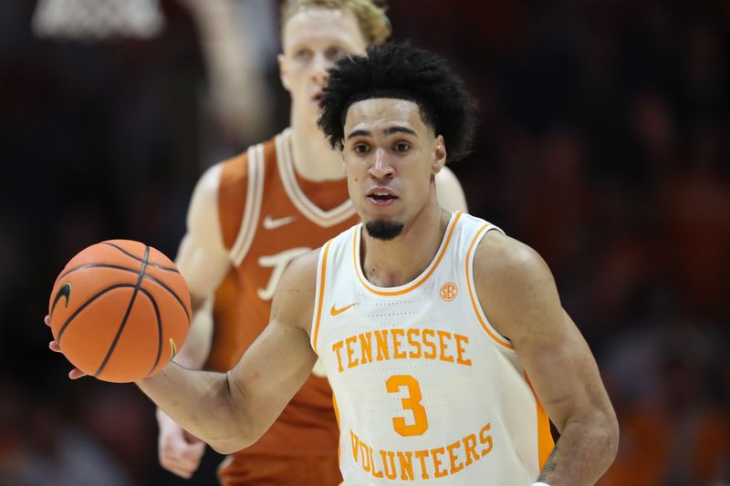 Jan 6, 2026; Knoxville, Tennessee, USA;  Tennessee Volunteers guard Bishop Boswell (3) moves the ball against the Texas Longhorns during the first half at Thompson-Boling Arena at Food City Center. Mandatory Credit: Randy Sartin-Imagn Images