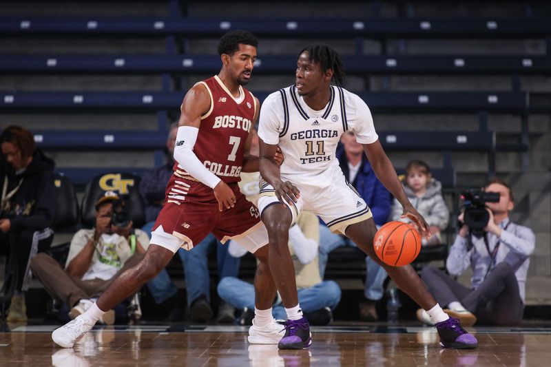 Jan 4, 2025; Atlanta, Georgia, USA; Boston College Eagles guard Joshua Beadle (7) defends Georgia Tech Yellow Jackets forward Baye Ndongo (11) in the first half at McCamish Pavilion. Mandatory Credit: Brett Davis-Imagn Images