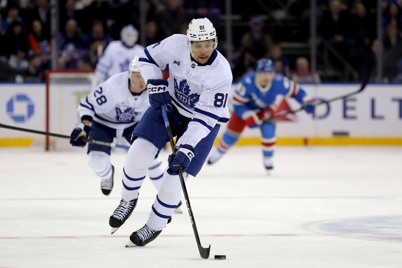 Mar 5, 2026; New York, New York, USA; Toronto Maple Leafs center Dakota Joshua (81) brings the puck up ice against the New York Rangers during the first period at Madison Square Garden. Mandatory Credit: Brad Penner-Imagn Images