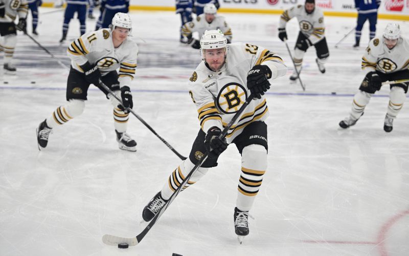 May 2, 2024; Toronto, Ontario, CAN;   Boston Bruins forward Charlie Coye (13) warms up before playing the Toronto Maple Leafs in game six of the first round of the 2024 Stanley Cup Playoffs at Scotiabank Arena. Mandatory Credit: Dan Hamilton-USA TODAY Sports