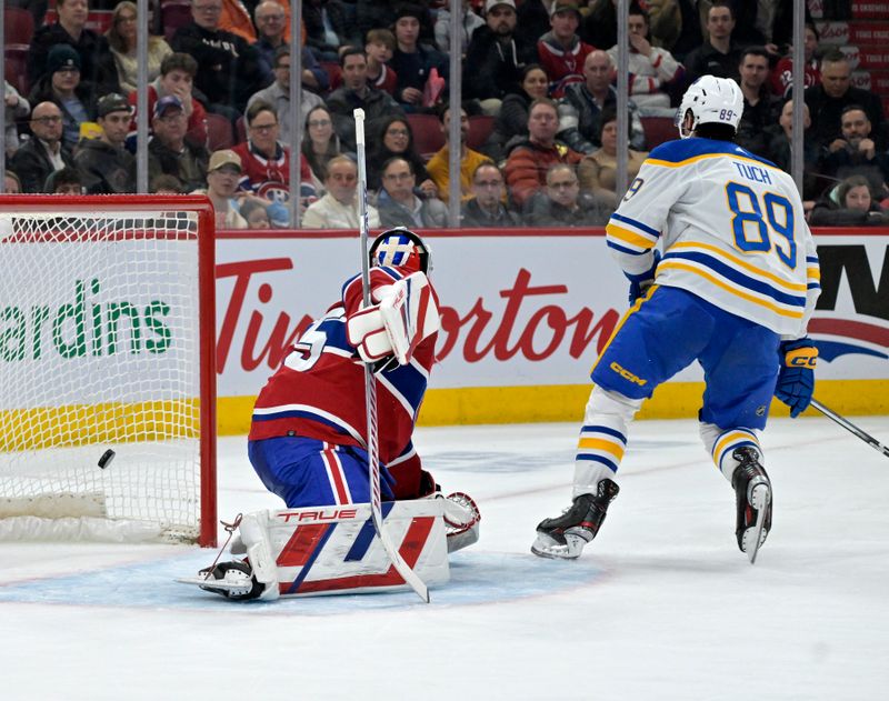 Feb 21, 2024; Montreal, Quebec, CAN; Buffalo Sabres forward Alex Tuch (89)  scores a goal against Montreal Canadiens goalie Sam Montembeault (35) during the second period at the Bell Centre. Mandatory Credit: Eric Bolte-USA TODAY Sports