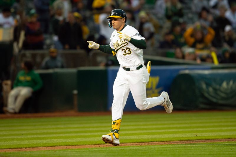 May 24, 2024; Oakland, California, USA; Oakland Athletics center fielder JJ Bleday (33) runs out his solo home run against the Houston Astros during the fifth inning at Oakland-Alameda County Coliseum. Mandatory Credit: D. Ross Cameron-USA TODAY Sports