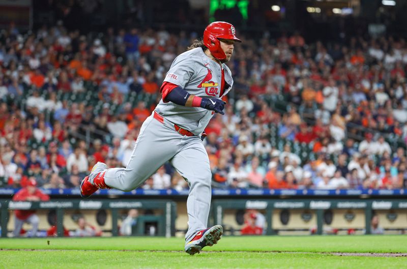 Jun 5, 2024; Houston, Texas, USA; St. Louis Cardinals shortstop Brandon Crawford (35) runs to first base on a double during the third inning against the Houston Astros at Minute Maid Park. Mandatory Credit: Troy Taormina-USA TODAY Sports