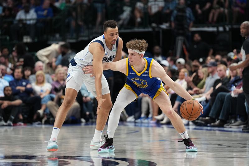 DALLAS, TX - MARCH 13: Brandin Podziemski #2 of the Golden State Warriors handles the ball during the game against the Dallas Mavericks on March 13, 2024 at the American Airlines Center in Dallas, Texas. NOTE TO USER: User expressly acknowledges and agrees that, by downloading and or using this photograph, User is consenting to the terms and conditions of the Getty Images License Agreement. Mandatory Copyright Notice: Copyright 2024 NBAE (Photo by Glenn James/NBAE via Getty Images)