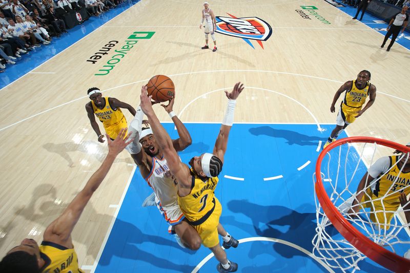 OKLAHOMA CITY, OK - JUNE 5: Shai Gilgeous-Alexander #2 of the Oklahoma City Thunder drives to the basket during the game against the Indiana Pacers during Game One of the 2025 NBA Finals on June 5, 2025 at Paycom Center in Oklahoma City, Oklahoma. NOTE TO USER: User expressly acknowledges and agrees that, by downloading and or using this photograph, User is consenting to the terms and conditions of the Getty Images License Agreement. Mandatory Copyright Notice: Copyright 2025 NBAE(Photo by Nathaniel S. Butler/NBAE via Getty Images)