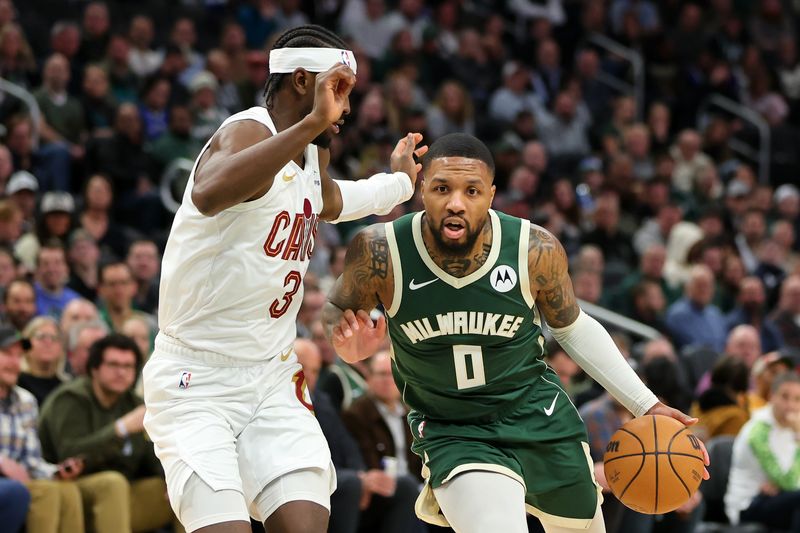 MILWAUKEE, WISCONSIN - JANUARY 24: Damian Lillard #0 of the Milwaukee Bucks drives to the basket against Caris LeVert #3 of the Cleveland Cavaliers during the first half of a game at Fiserv Forum on January 24, 2024 in Milwaukee, Wisconsin. NOTE TO USER: User expressly acknowledges and agrees that, by downloading and or using this photograph, User is consenting to the terms and conditions of the Getty Images License Agreement. (Photo by Stacy Revere/Getty Images)