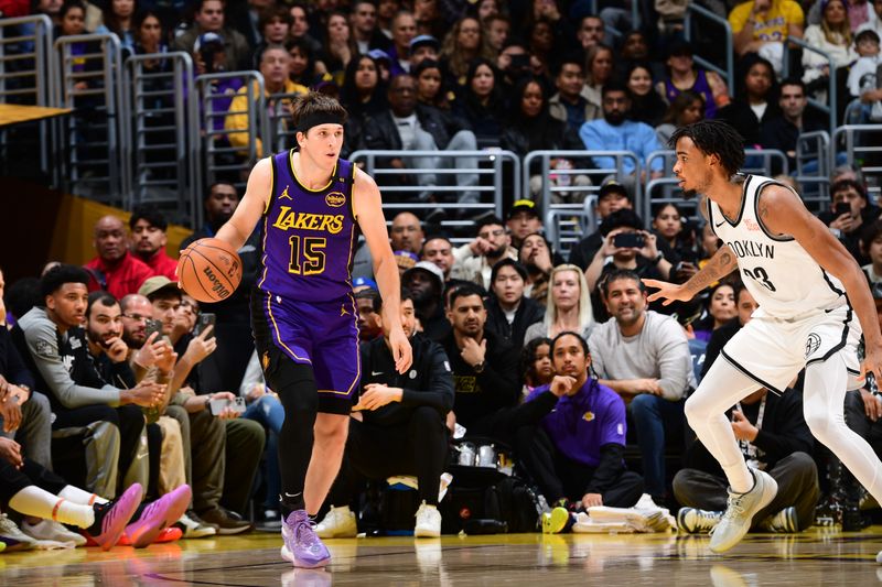 LOS ANGELES, CA - JANUARY 17: Austin Reaves #15 of the Los Angeles Lakers dribbles the ball during the game against the Brooklyn Nets on January 17, 2025 at Crypto.Com Arena in Los Angeles, California. NOTE TO USER: User expressly acknowledges and agrees that, by downloading and/or using this Photograph, user is consenting to the terms and conditions of the Getty Images License Agreement. Mandatory Copyright Notice: Copyright 2025 NBAE (Photo by Adam Pantozzi/NBAE via Getty Images)