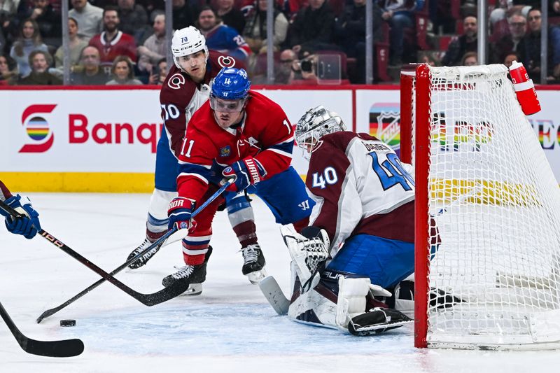 Jan 15, 2024; Montreal, Quebec, CAN; Montreal Canadiens right wing Brendan Gallagher (11) shoots the puck on Colorado Avalanche goalie Alexandar Georgiev (40) during the first period at Bell Centre. Mandatory Credit: David Kirouac-USA TODAY Sports