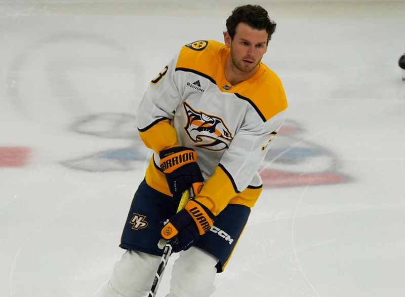 Oct 25, 2024; Chicago, Illinois, USA; Nashville Predators defenseman Jeremy Lauzon (3) warms up before a game against the Chicago Blackhawks at United Center. Mandatory Credit: David Banks-Imagn Images