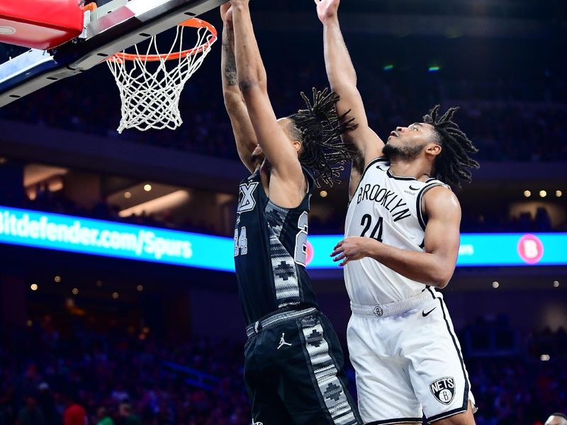 AUSTIN, TX - MARCH 17: Cam Thomas #24 of the Brooklyn Nets blocks the shot by Devin Vassell #24 of the San Antonio Spurs during the game on March 17, 2024 at the Moody Center in Austin, Texas. NOTE TO USER: User expressly acknowledges and agrees that, by downloading and or using this photograph, user is consenting to the terms and conditions of the Getty Images License Agreement. Mandatory Copyright Notice: Copyright 2024 NBAE (Photos by Michael Gonzales/NBAE via Getty Images)