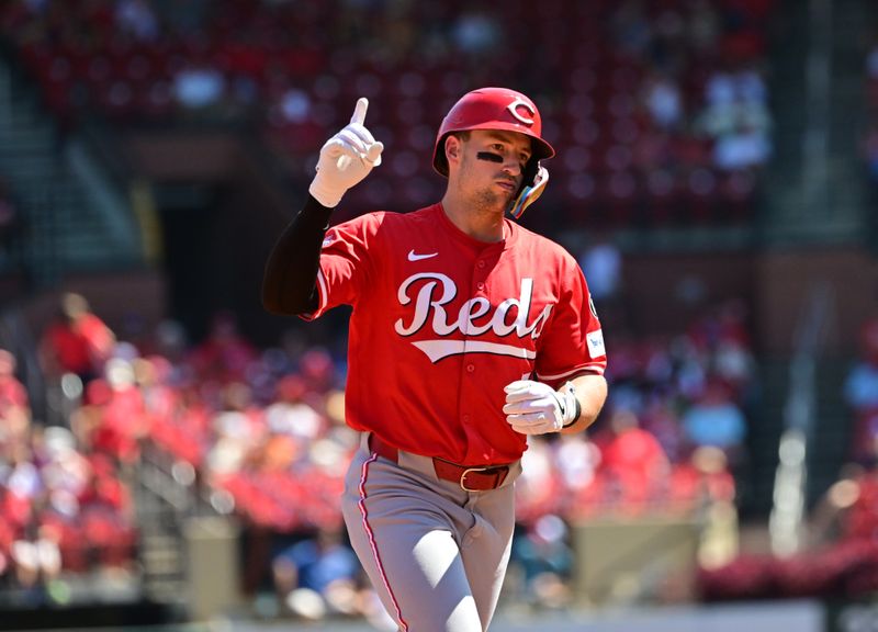 Sep 17, 2025; St. Louis, Missouri, USA; Cincinnati Reds first baseman Spencer Steer (7) signals to the Cincinnati Reds dugout as he rounds the bases after hitting a three-run home run in the fourth inning against the St. Louis Cardinals at Busch Stadium. Mandatory Credit: Tim Vizer-Imagn Images