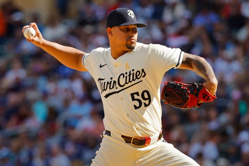 Sep 1, 2024; Minneapolis, Minnesota, USA; Minnesota Twins relief pitcher Jhoan Duran (59) throws to the Toronto Blue Jays in the ninth inning at Target Field. Mandatory Credit: Bruce Kluckhohn-USA TODAY Sports